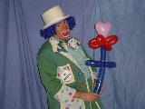 Clown Holding a Flower Balloon